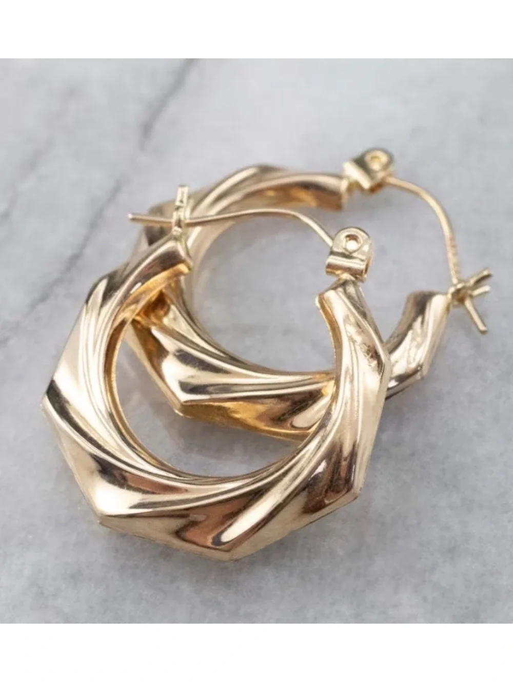 925 Sterling Silver posts gold twist earrings.